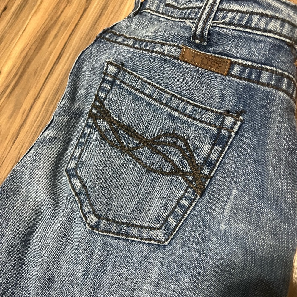 Cowgirl Tuff Jeans.